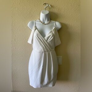 Sarah LA white off the shoulder dress